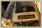 Hong Kong bus at Central. IFC Building in background - © B Hull